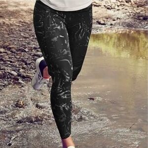 Athleta  marble velocity stash pocket 7/8 leggings